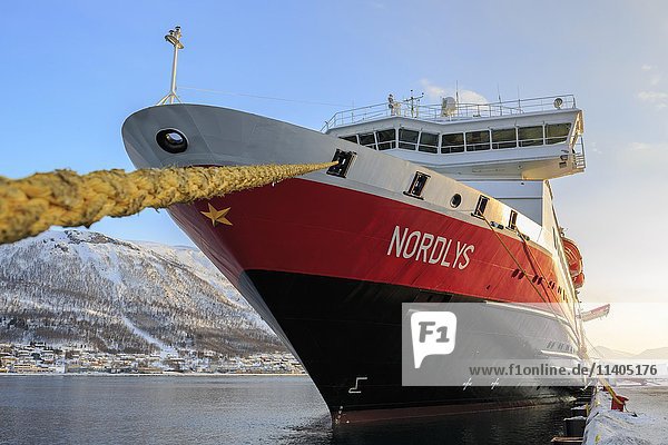 Hurtigruten MS Nordlys anchored in the harbor  Tromso  Troms Province  Norway  Europe