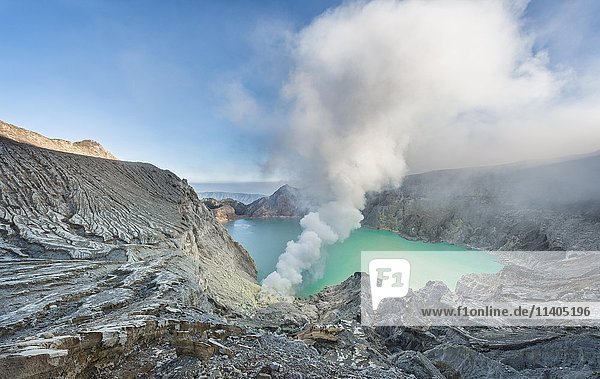 Volcano Kawah Ijen  volcanic craters with crater lake and steaming vents  morning light  Banyuwangi  Sempol  Eastern Java  Indonesia  Asia