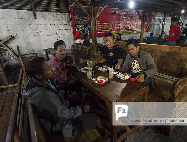 Locals eating Indonesian food  Food Market  Yogyakarta  Java  Indonesia  Asia