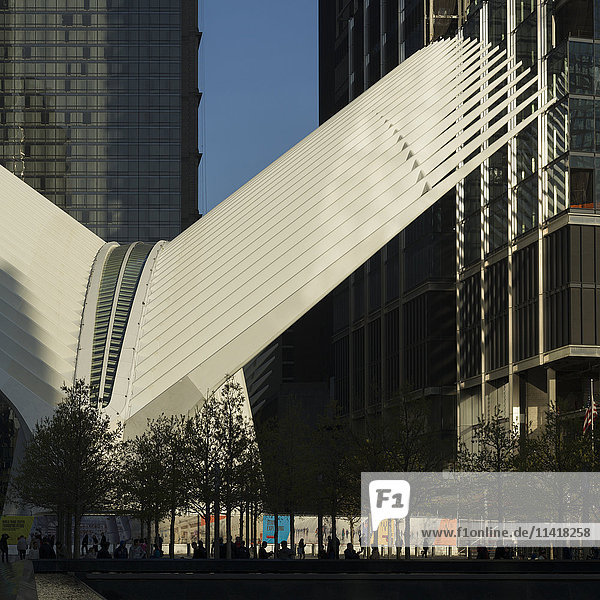 'A unique structure of two white wings between skyscrapers; New York City  New York  United States of America'