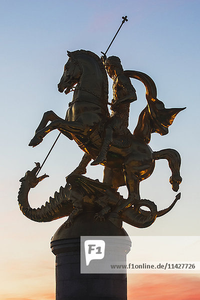 'Freedom Monument  commonly known as the St. George Statue  located on Freedom Square  at dawn; Tbilisi  Georgia'