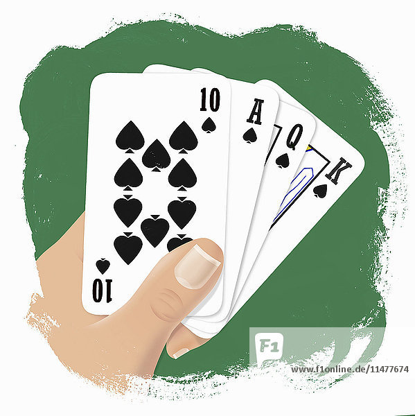 Hand holding playing cards