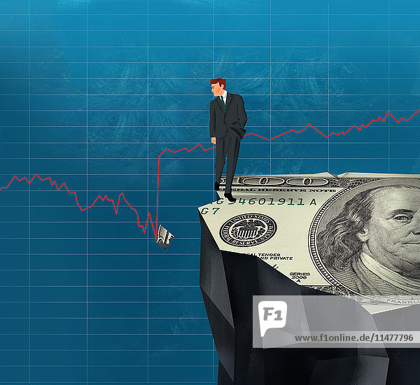 Businessman on cliff looking at broken piece of dollar bill in line graph