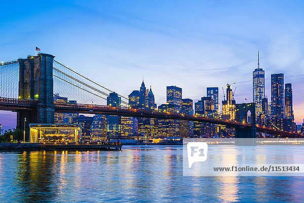 Brooklyn Bridge and Manhattan skyline at dusk  New York City  United States of America  North America