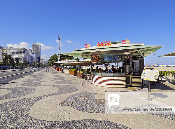 Portuguese wave pattern pavement and beach bar at Copacabana  Rio de Janeiro  Brazil  South America
