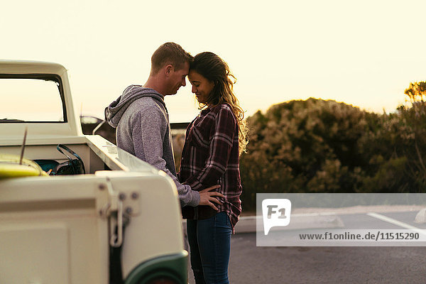 Romantic couple with pickup truck at Newport Beach  California  USA