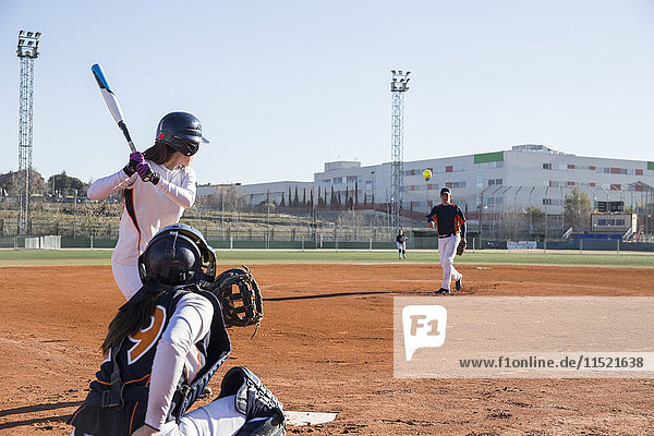 Female batter ready to hit the ball during a baseball game