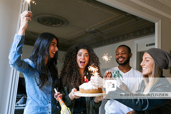 Group of young people celebrating birthday