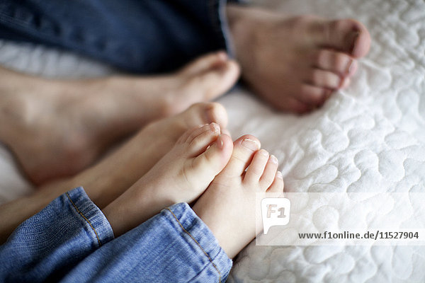 Parents and childs feet