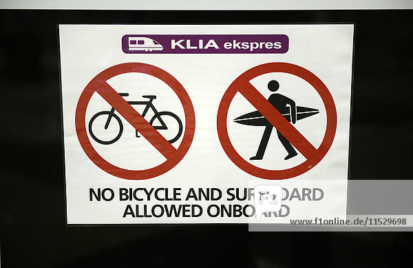 South-East Asia  Malaysia  Kuala Lumpur  close-up on a 'no bycicle and surfboard allowed onboard' Kuala Lumpur Express  the fast train connecting Downtown KL and KL airport