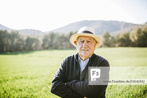 Spain  Tarragona  Portrait of senior man in the field