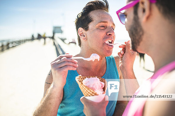 Los Angeles  Venice  gay couple feeding each other with icecream