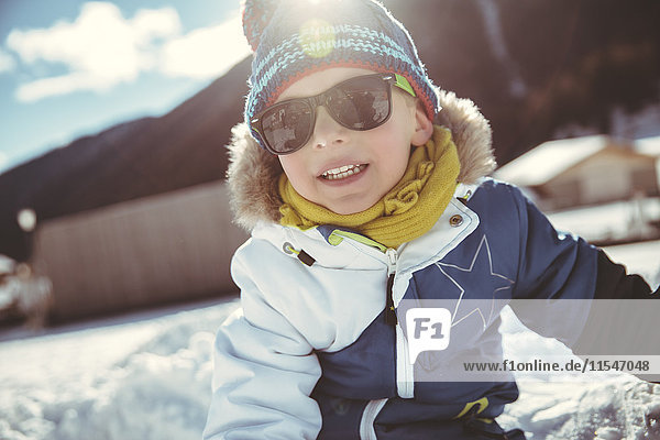 Italy  Val Venosta  Slingia  boy with sunglasses in snow