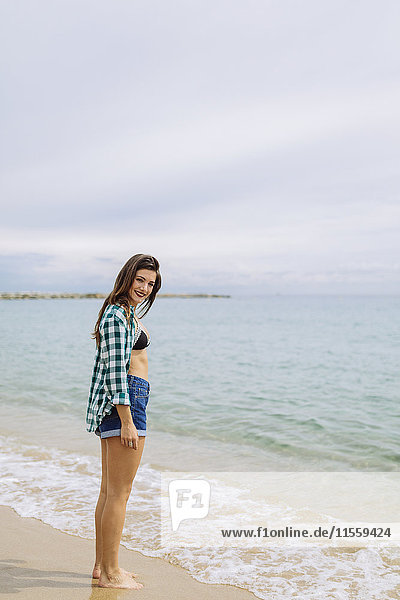 Young woman enjoying the beach