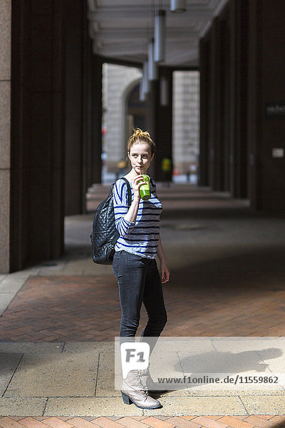 USA  New York City  woman drinking a smoothie in Manhattan