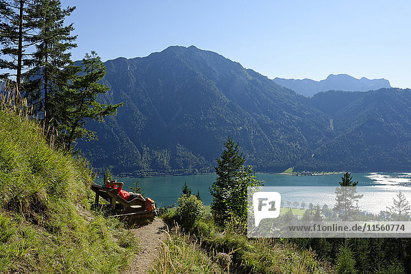 Austria  Tyrol  Rofan Mountains  hiker relaxing on a lounge