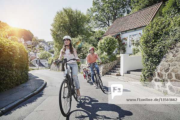 Germany  Hamburg  Blankenese  family riding e-bikes