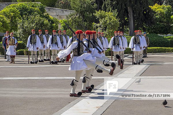 Changing of the guards in front of Parliament  Evzones at the Tomb of the Unknown Soldier on Syntagma Square in Athens  Greece  Europe