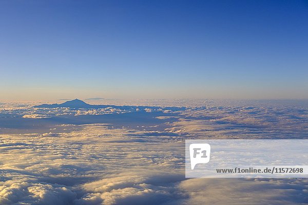Volcano Pico del Teide over clouds  Tenerife  Canary Islands  Spain  Europe