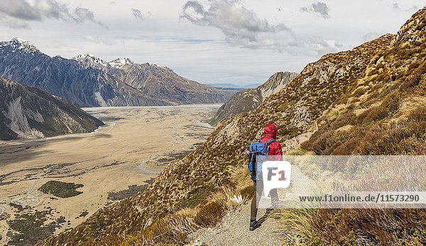 Hiker  View into the Hooker Valley from Sealy Tarns Track  Mount Cook National Park  Canterbury Region  South Island  New Zealand  Oceania