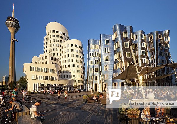 Neuer Zollhof with Gehry buildings and the Rhine Tower  Düsseldorf  North Rhine-Westphalia  Germany  Europe