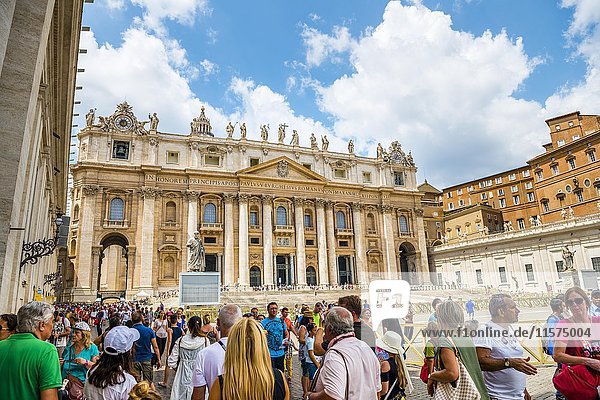St. Peter's Basilica  St. Peter's Square with tourists  Vatican city  Vatican  Rome  Lazio  Italy  Europe