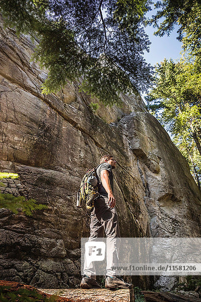 Mid adult man trekking through Murrin Provincial Park Squamish British Columbia Canada