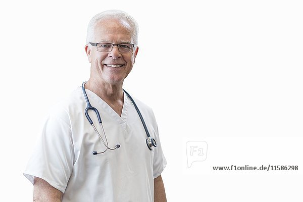 Senior male doctor smiling towards camera  portrait.