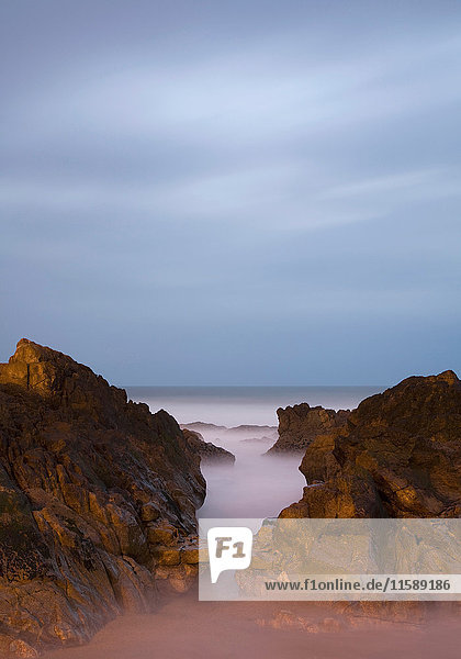 Rocky coastline at night