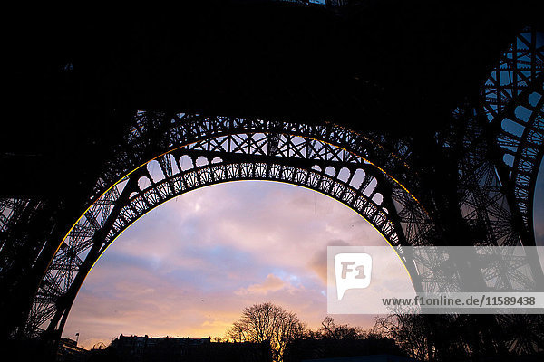 Underneath Eiffel Tower at sunset  Paris  France