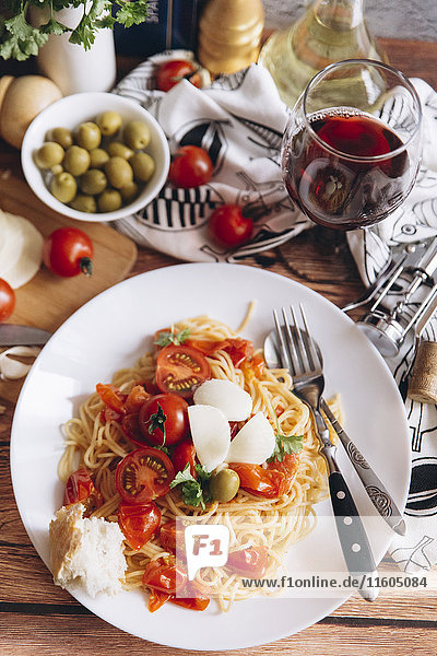 Spaghetti with bread  tomatoes and wine