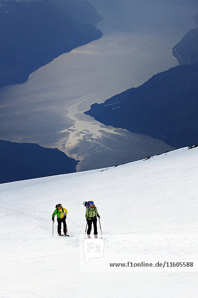 People skiing in winter landscape