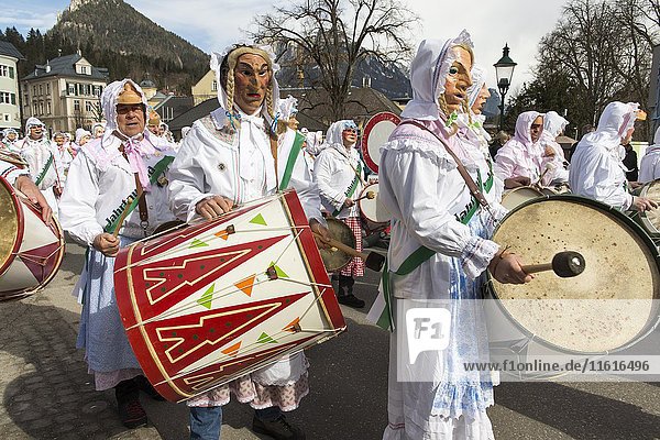 Aussee Carnival  men with masks and drums  white robes  Trommelweiber  Bad Aussee  Styria  Austria  Europe