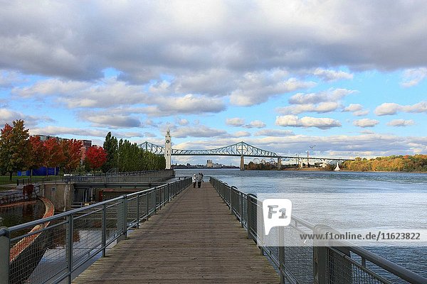 Old Montreal Port area  with Saint Lawrence River in autumn  Quebec  Canada.