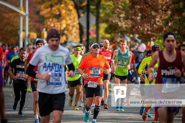 Runners pass through Harlem in New York near the 22 mile mark near Mount Morris Park on Sunday  November 6  2016 in the 46th annual TCS New York City Marathon. About 50  000 runners from over 120 countries are expected to compete in the race  the world's largest marathon.