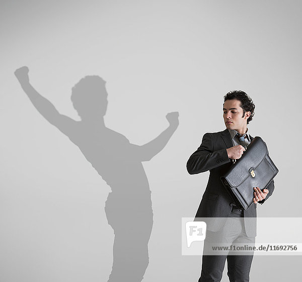 Man with shadow in background dancing