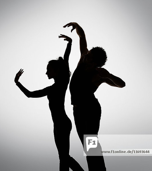 Silhouette of couple dancing