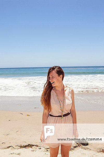 Happy young woman on a beach