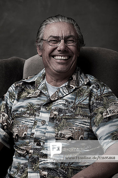 Portrait of a senior man laughing