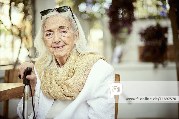 Portrait of smiling older Caucasian woman wearing scarf