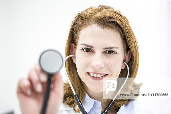 Portrait of smiling doctor with stethoscope