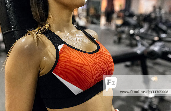 Close-up of woman sweating in gym