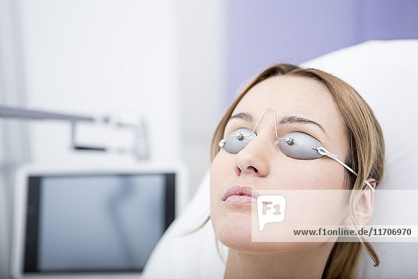 Woman in medical practice wearing safety goggles