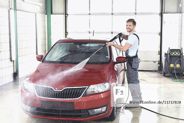 Man cleaning car at car wash