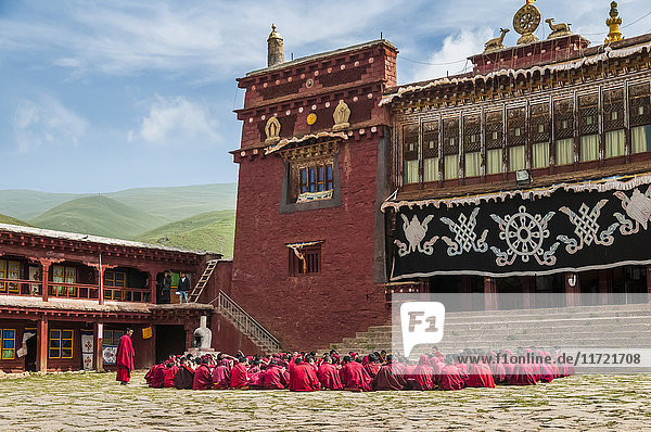 'Litang Monastery a group of young monks are preparing the tibetan debate West of Sichuan province; Litang Sichuan China'