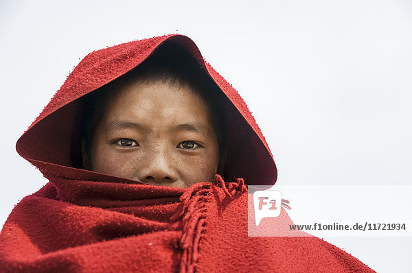 Porträt eines jungen Mönchs des Klosters Litang in einem tibetischen Dorf im Westen der Provinz Sichuan; Litang  Sichuan  China'.