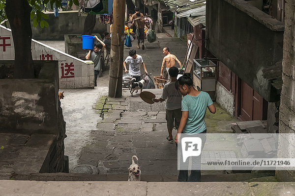 'Pedestrians on old local streets of Chongqing City; Chongqing Chongqing province China'