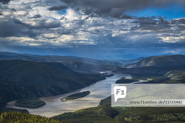 The Yukon River flows northward in this view from the Midnight Dome; Dawson City  Yukon  Canada
