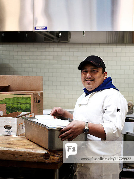 Chef working in kitchen