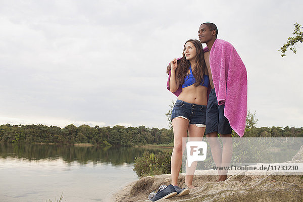 Young couple enjoying lake